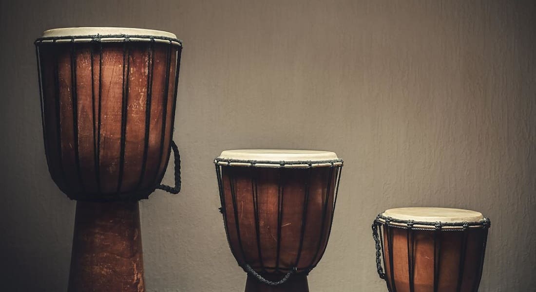 Three djembes of different sizes lined up