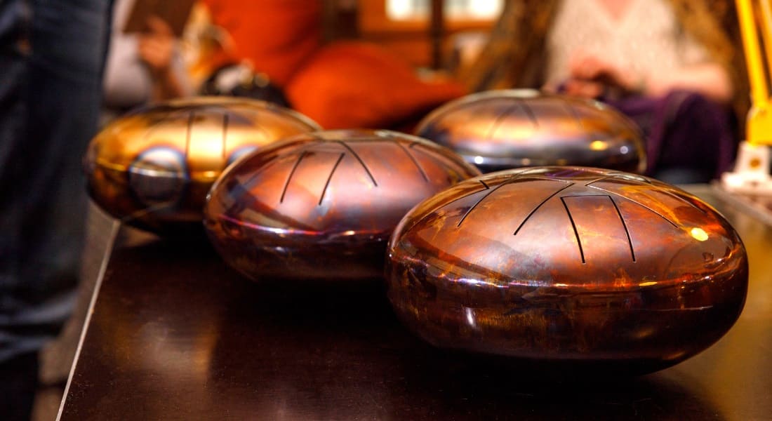 4 Tank drums on a table