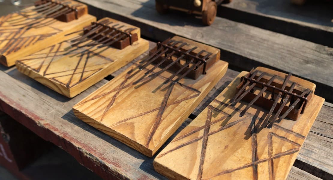 4 Traditional mbiras arranged on a table