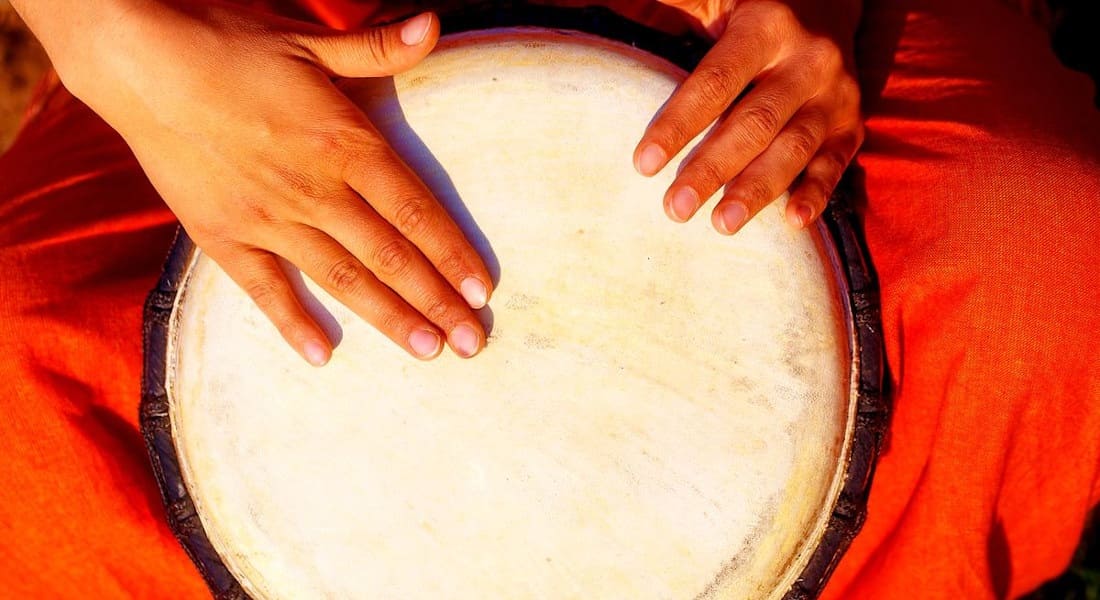 A djembe player seen from above