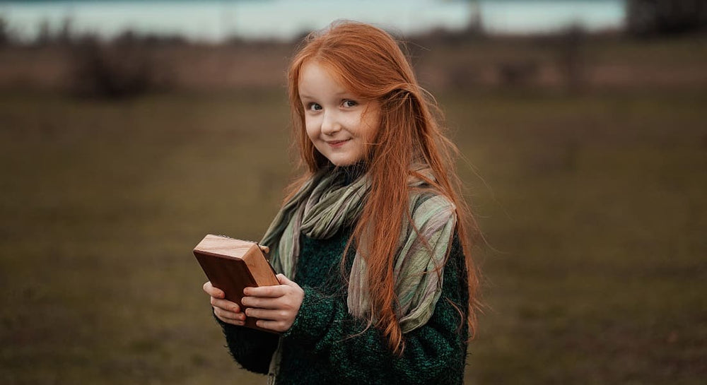 A little girl with a kalimba