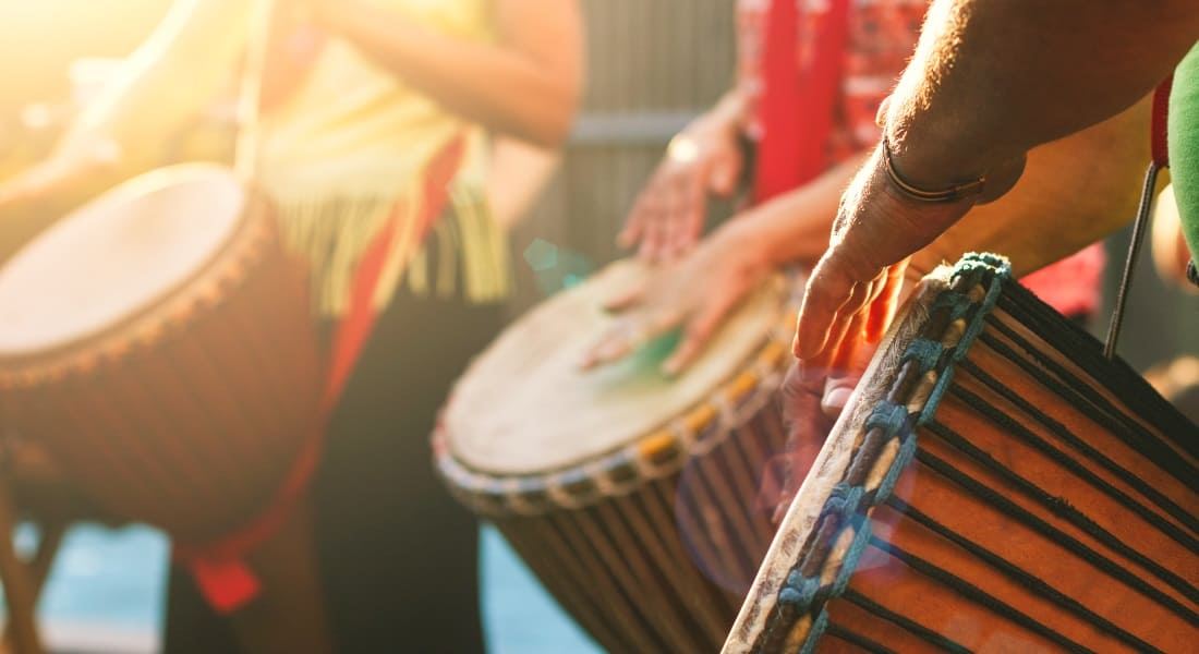 A group of musicians with African drums