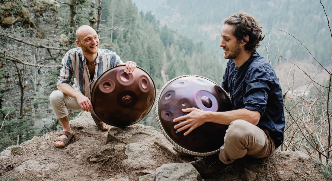 Malte Marten and Alexander Mercks on a mountain with handpans