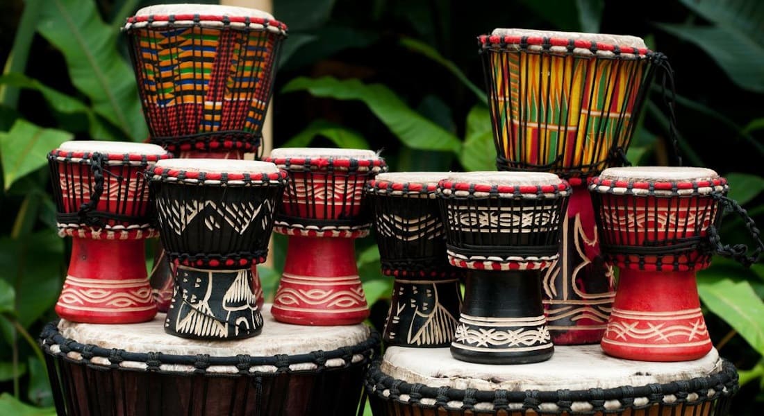 Many small djembes on two large djembes