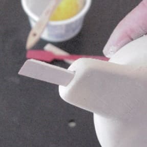 Popsicle stick inserted into the mouthpiece