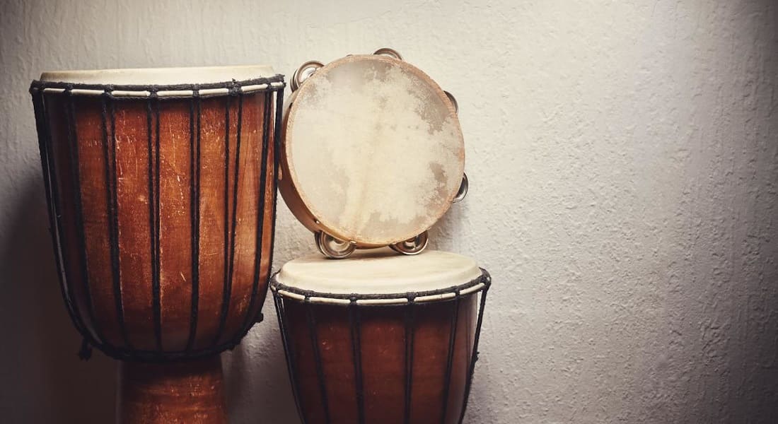 A tambourine on a djembe