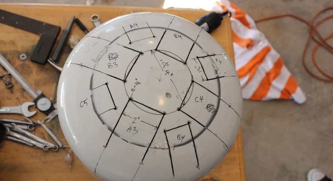 A tongue drum being made