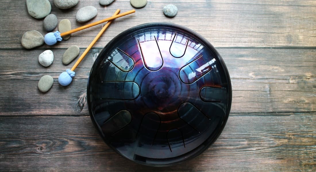A tongue drum on a wooden floor
