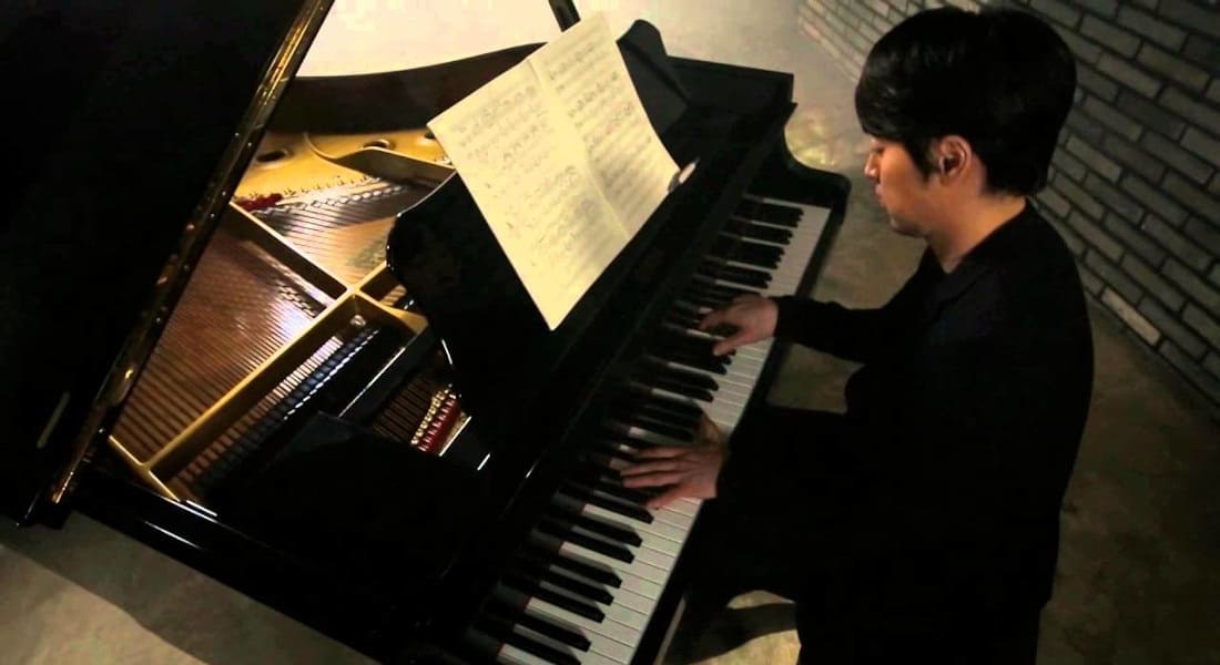 Yiruma playing the piano
