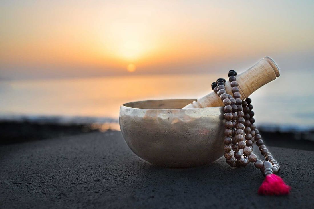 A Tibetan singing bowl and a Tibetan mala