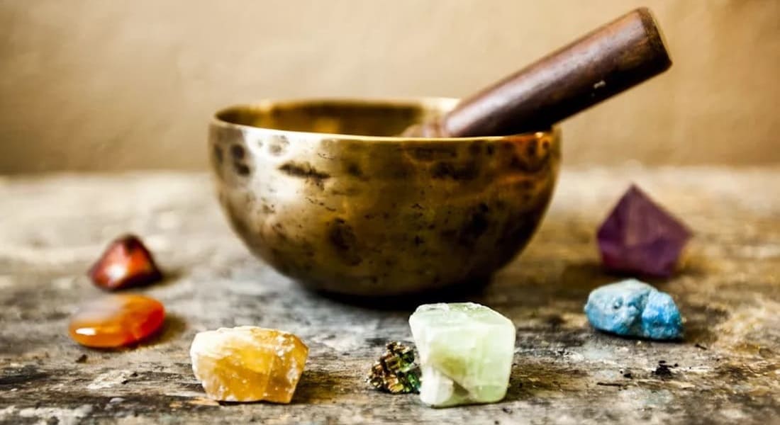 A Tibetan singing bowl surrounded by stones