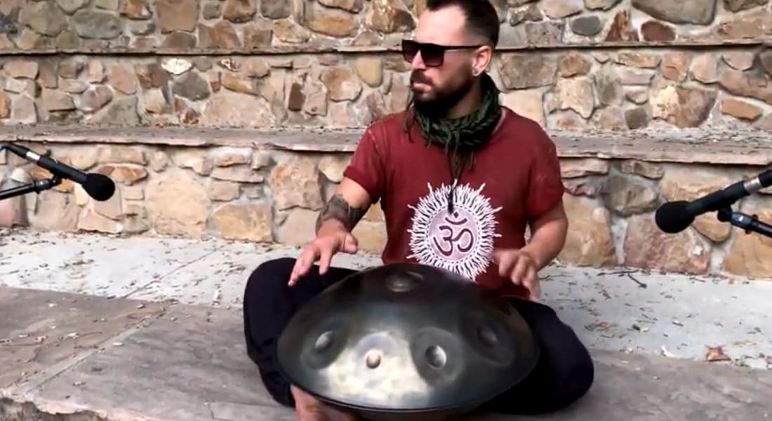 Adrian Portia playing the Hang drum on the street