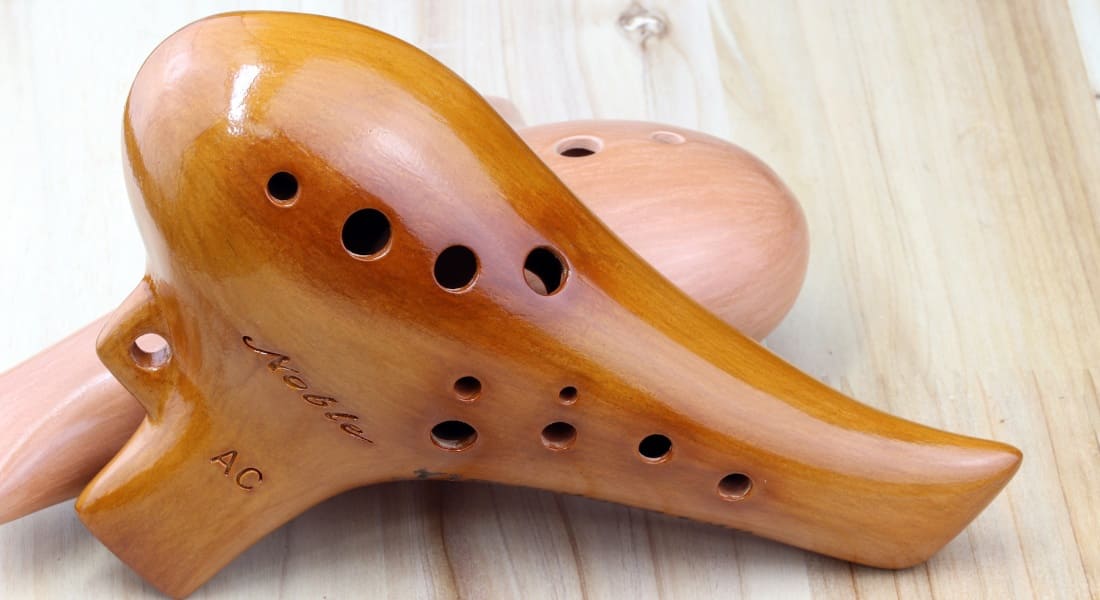 A wooden alto ocarina in C