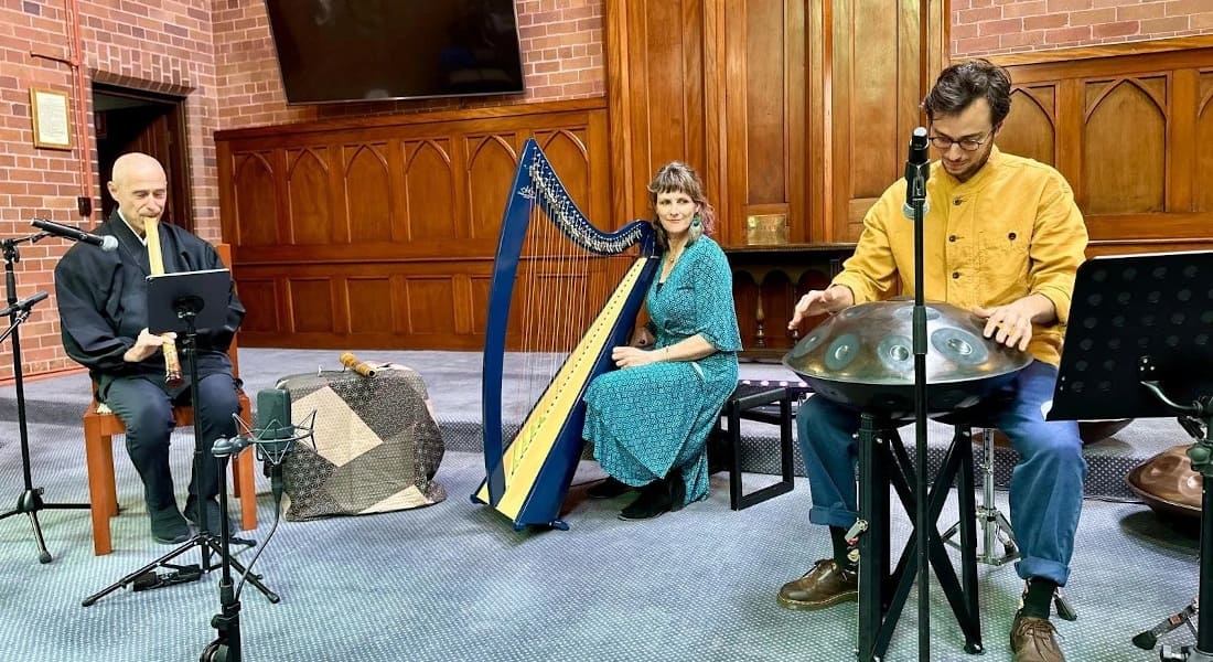 Baran Yildiz in an orchestra playing his handpan