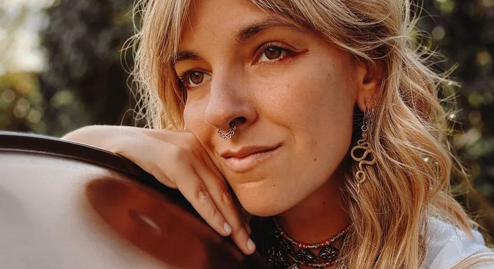 Changeofcolours looking into the distance with a handpan