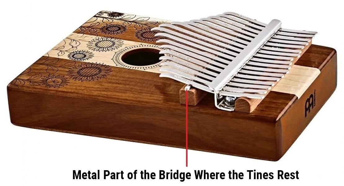 Close-up of the kalimba’s front bridge