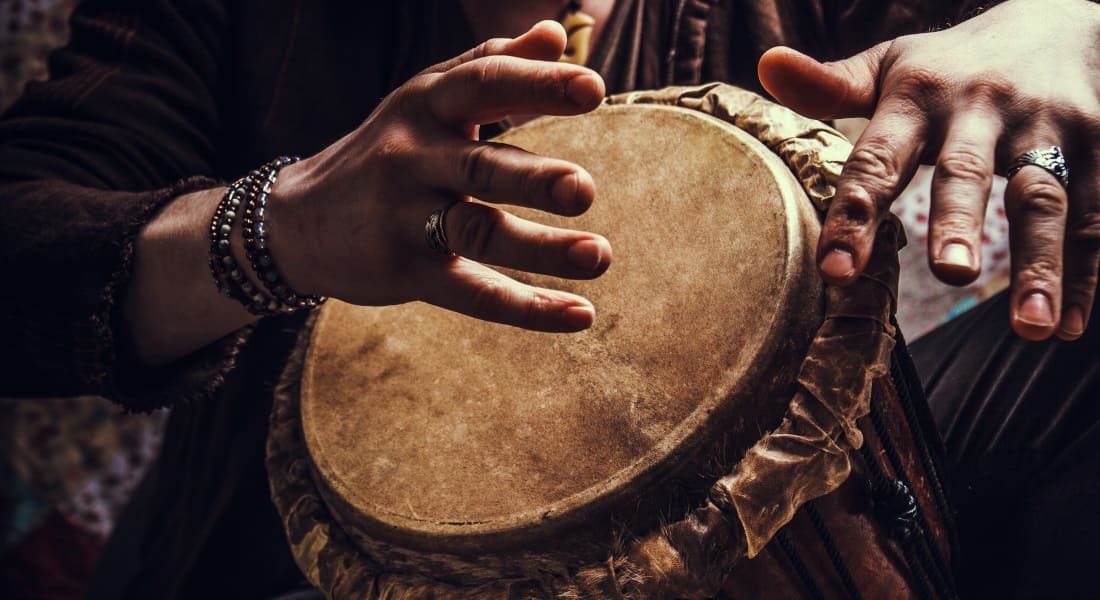 Close-up of a djembe player