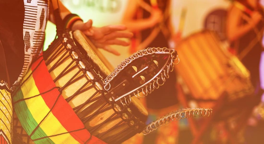 Close-up of a traditional djembe player