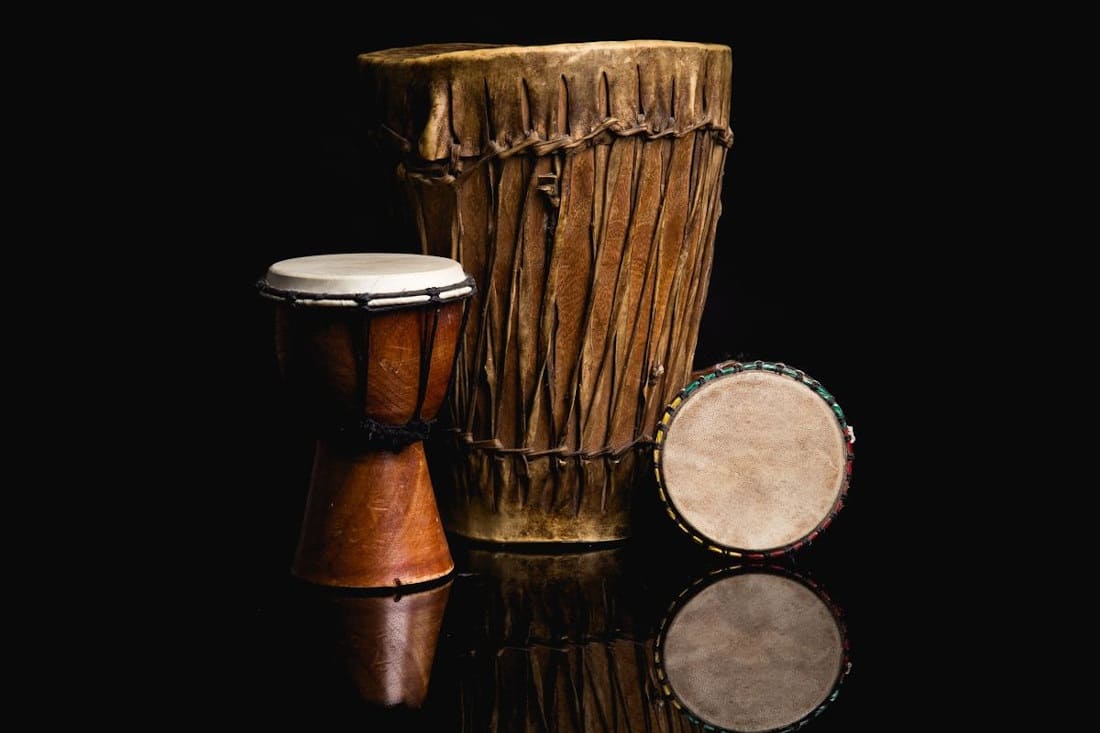What are the differences between a djembe and a tam-tam?