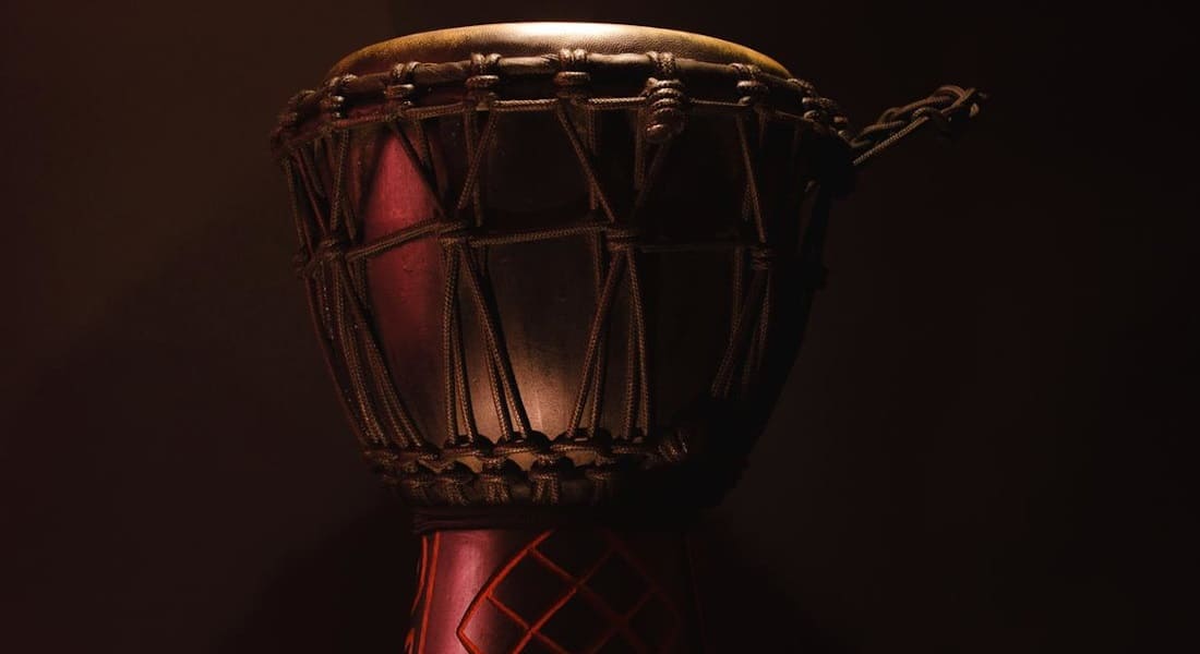 A djembe with tension knots in the rope lacing