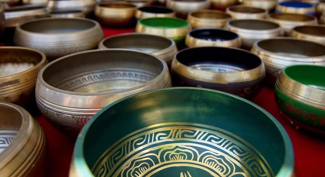 Several dozen Tibetan bowls