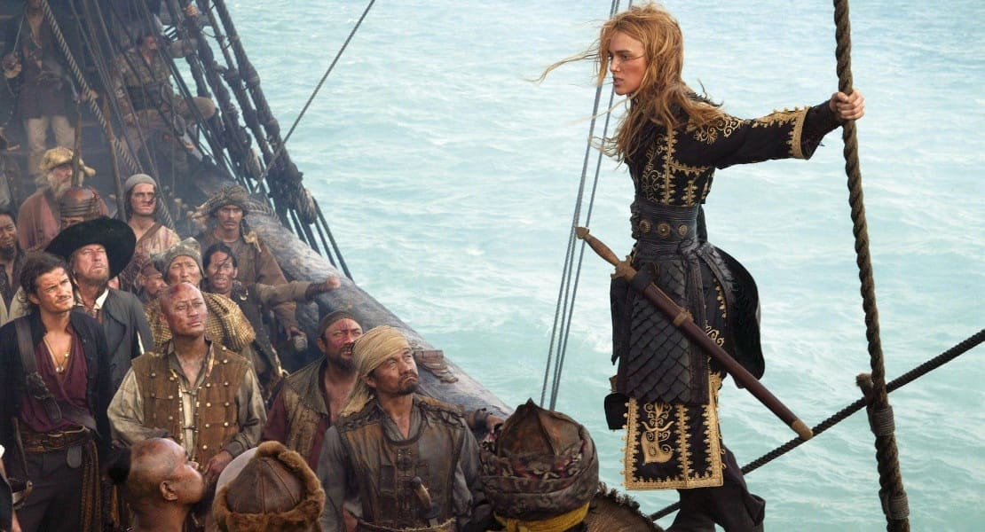 Elizabeth Swann with pirates on a boat