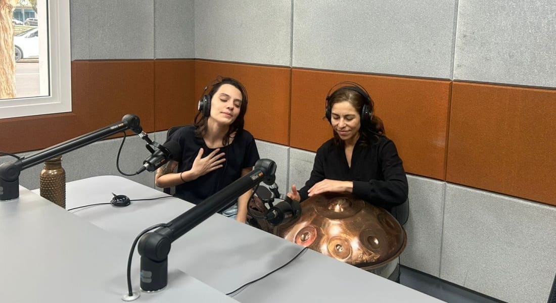 Grace Harteming playing handpan in a studio