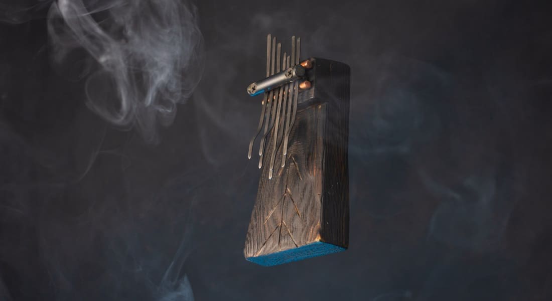 A kalimba surrounded by smoke