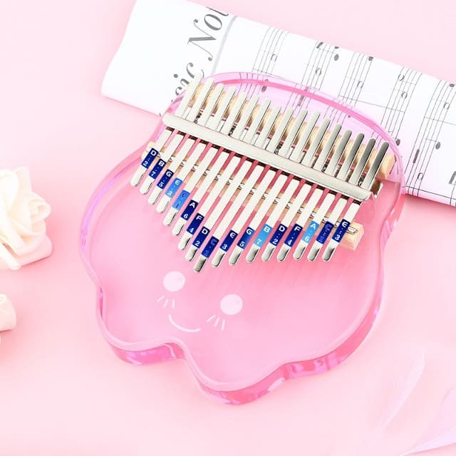 Transparent kalimba instrument with pink starfish
