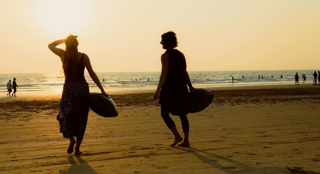 The Mea duo at the beach, each carrying a handpan