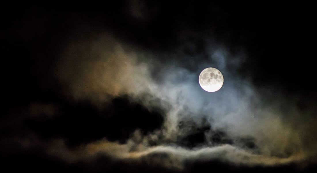 A night sky with a moon