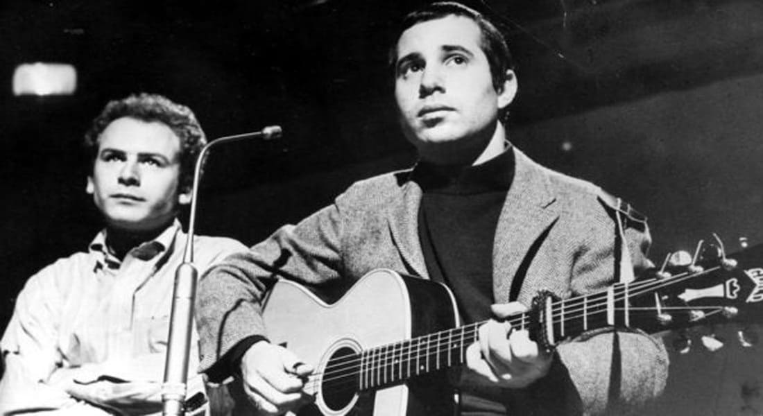 Simon and Garfunkel with a guitar