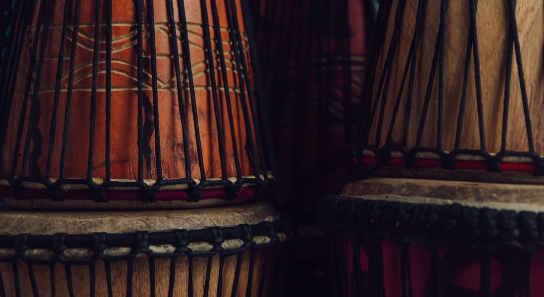 Several stacked djembes