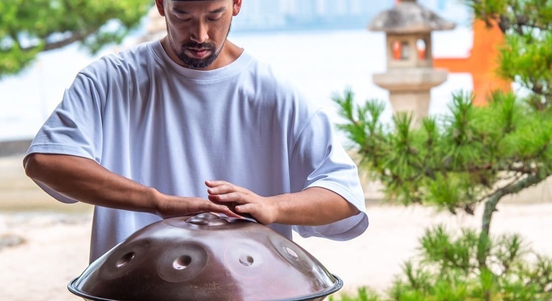 Takao Minemoto playing a handpan
