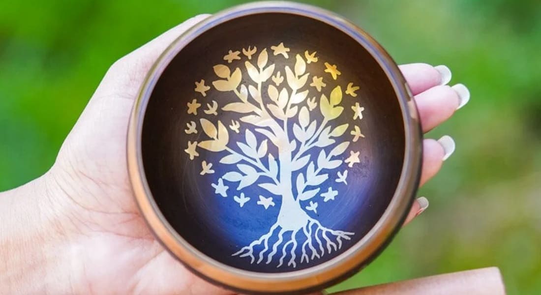 Tibetan bowl with a tree of life engraved on it