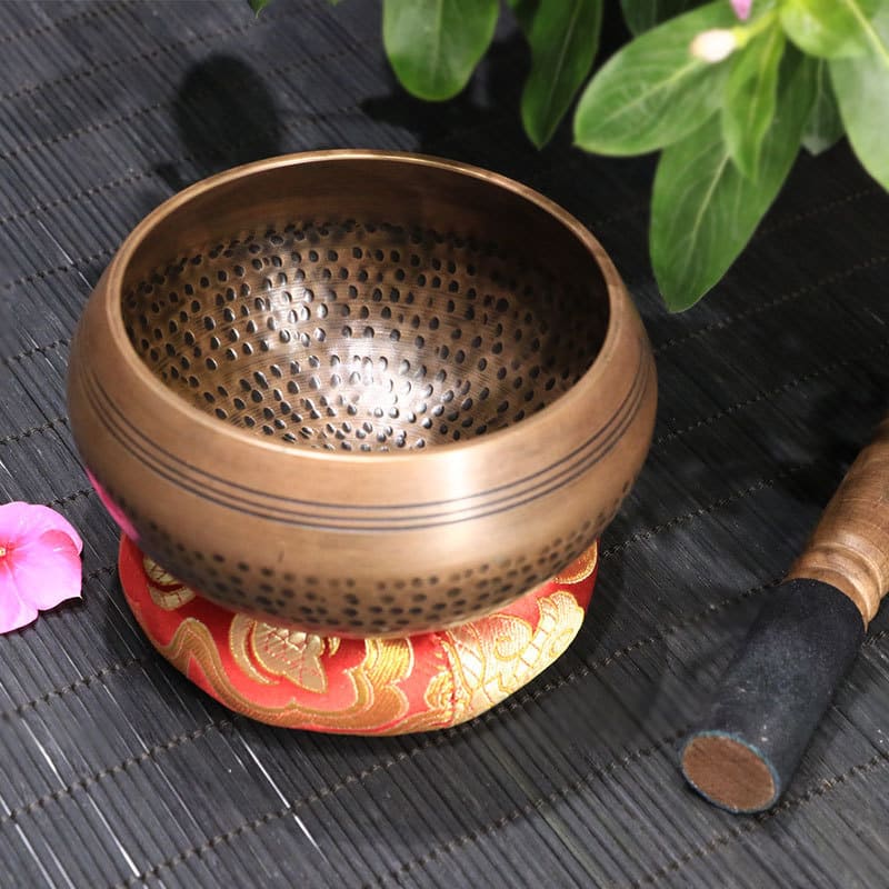 Copper Tibetan bowl presentation