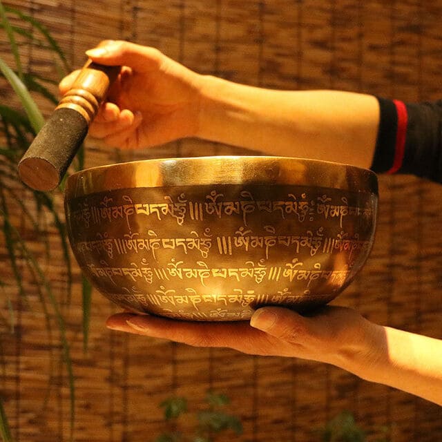 Giant Tibetan singing bowl in hand