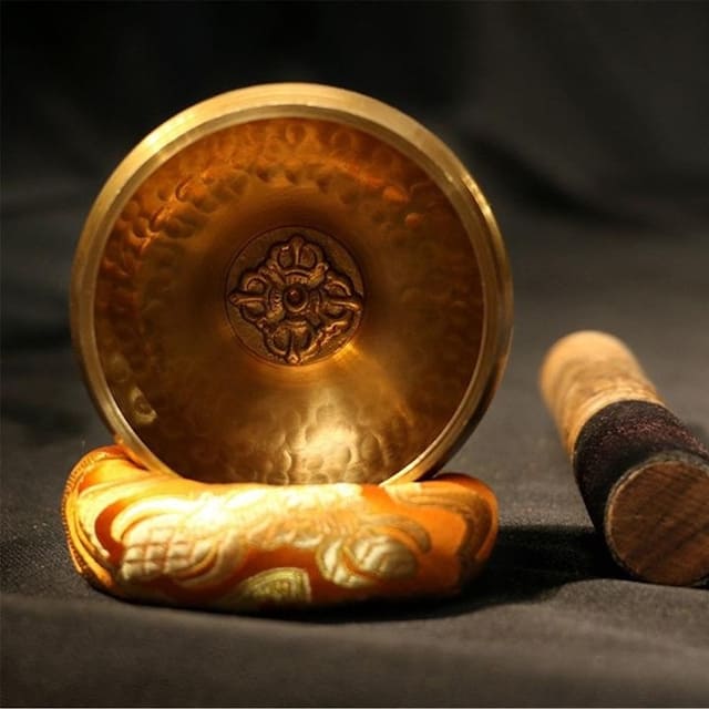 Traditional Tibetan singing bowl presentation
