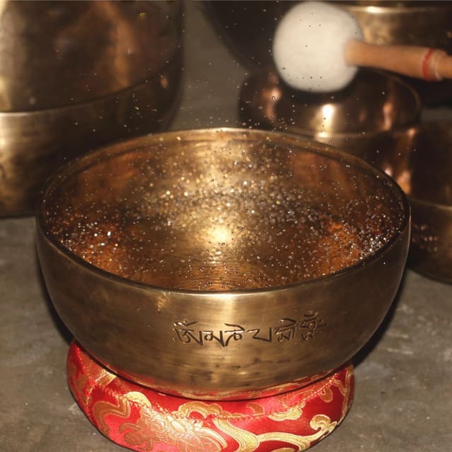 Tibetan singing bowl for water with striker