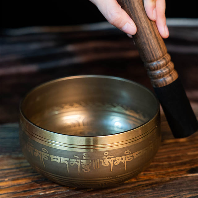 Traditional singing bowl with mallet