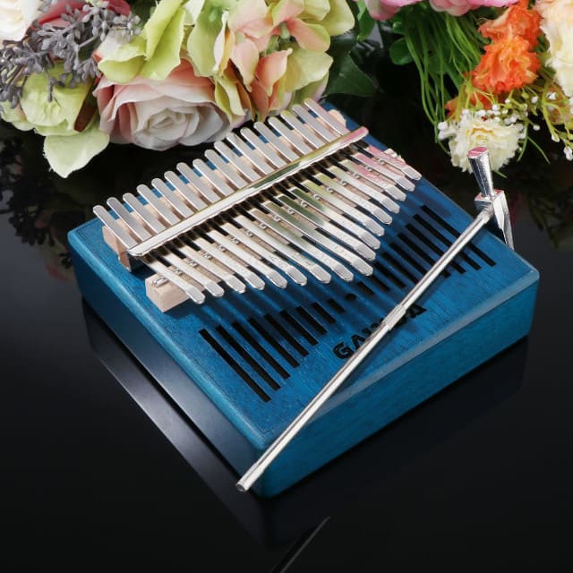 Instrument de musique piano à pouces bleu 